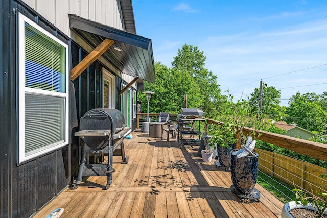 wooden deck featuring grilling area