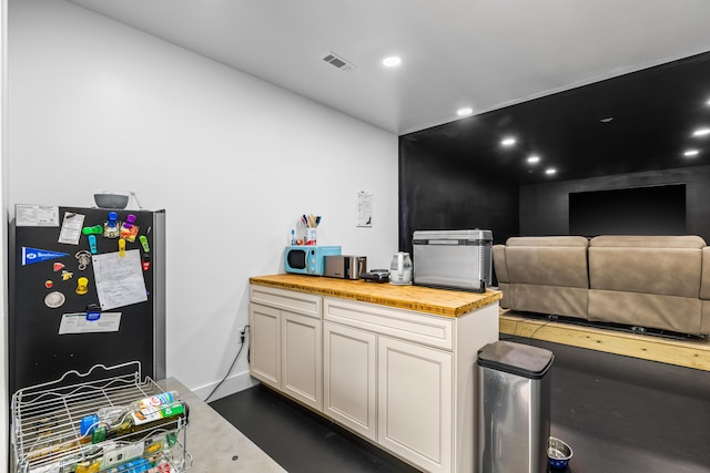 miscellaneous room featuring recessed lighting and baseboards