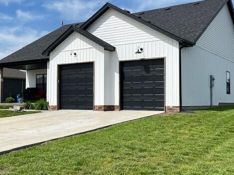 garage with driveway