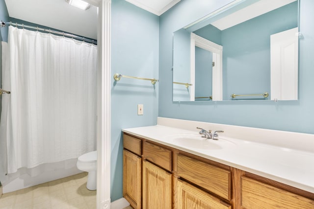 bathroom featuring toilet and vanity
