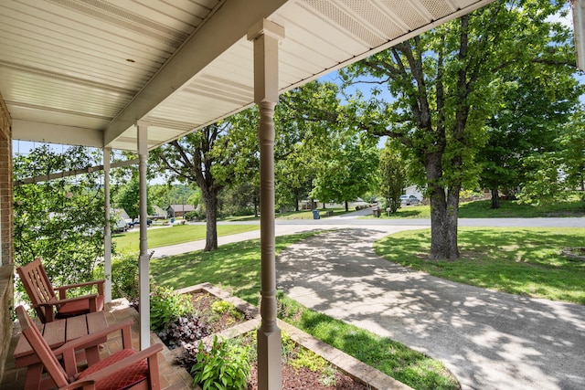 view of patio featuring a porch