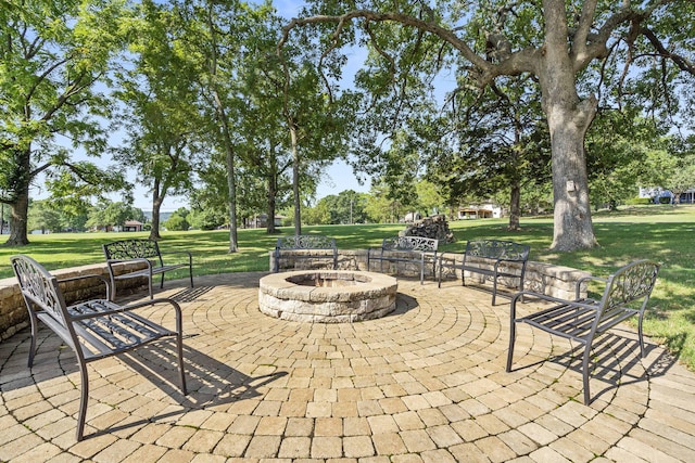 view of patio with an outdoor fire pit