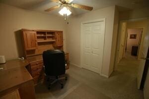 office space with a ceiling fan