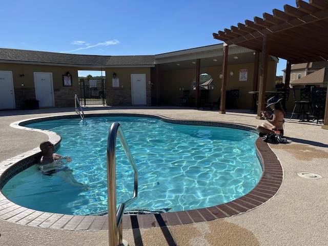134 Monte Christo Dr, Hollister, MO 65672 - outdoor pool with a patio area and fence
