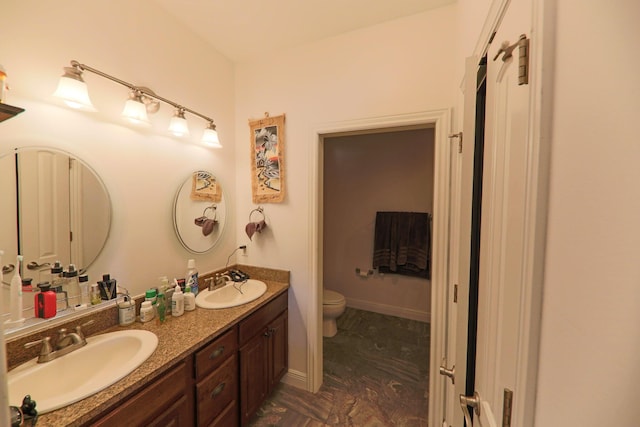 134 Monte Christo Dr, Hollister, MO 65672 - bathroom featuring toilet and double vanity