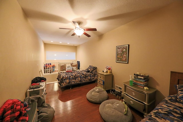 134 Monte Christo Dr, Hollister, MO 65672 - bedroom featuring wood finished floors, ceiling fan, and baseboards