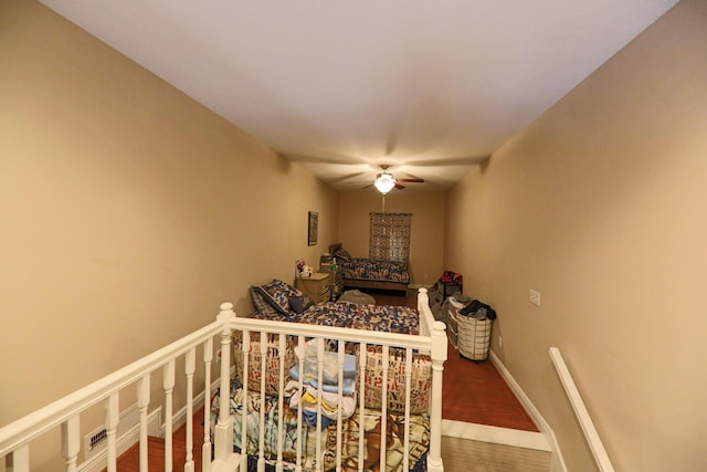 134 Monte Christo Dr, Hollister, MO 65672 - bedroom with ceiling fan and wood finished floors