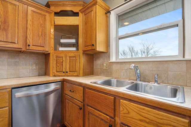 12048 N Farm Road 93, Walnut Grove, MO 65770 - kitchen featuring stainless steel dishwasher, a sink, and brown cabinets
