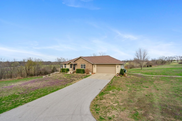12048 N Farm Road 93, Walnut Grove, MO 65770 - ranch-style home with a garage, brick siding, driveway, and a front lawn