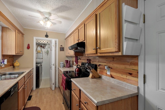 kitchen with black / electric stove, stainless steel dishwasher, a sink, under cabinet range hood, and a ceiling fan