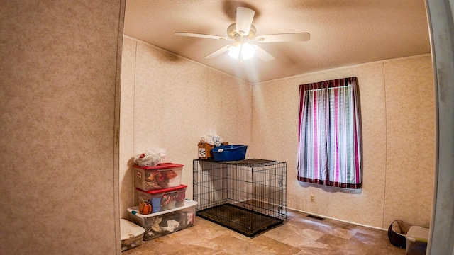 1156 SE 180th Rd, Clinton, MO 64735 - bathroom featuring a ceiling fan and a textured ceiling