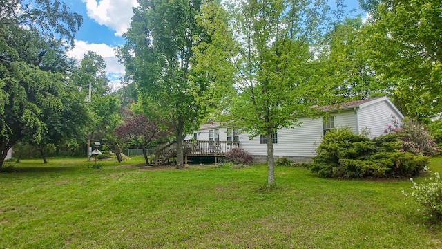 1156 SE 180th Rd, Clinton, MO 64735 - view of green lawn with a deck