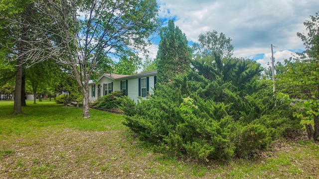 1156 SE 180th Rd, Clinton, MO 64735 - view of property exterior featuring a yard