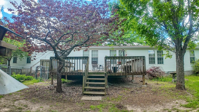 1156 SE 180th Rd, Clinton, MO 64735 - back of house with a deck, stairs, and fence