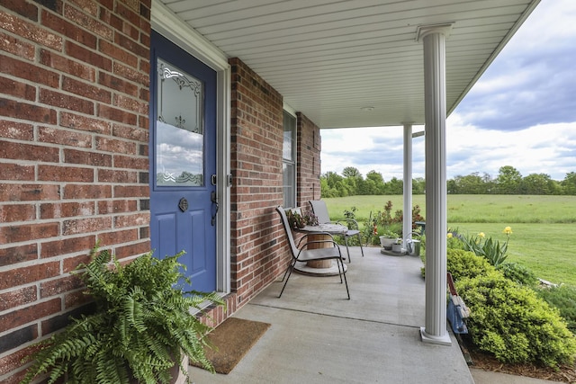 view of patio featuring a porch