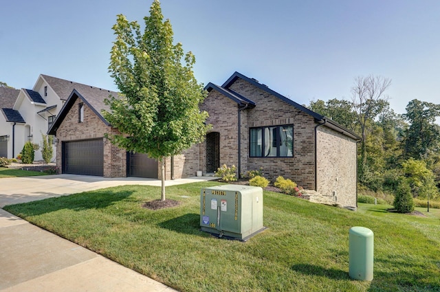 view of front of home with concrete driveway, a front lawn, brick siding, and an attached garage
