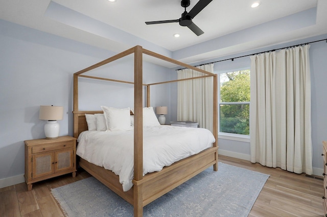 bedroom featuring baseboards, light wood finished floors, recessed lighting, and ceiling fan