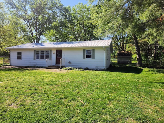 single story home featuring a front yard