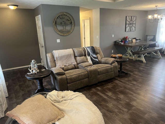156 Southern Cross Dr, Clever, MO 65631 - living room featuring dark wood finished floors, a chandelier, and baseboards
