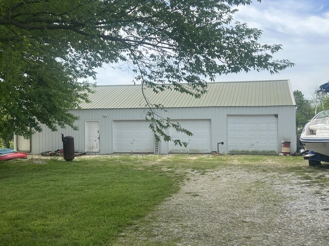 156 Southern Cross Dr, Clever, MO 65631 - detached garage with driveway
