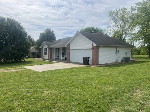 156 Southern Cross Dr, Clever, MO 65631 - ranch-style home with a front yard, an attached garage, driveway, and central air condition unit