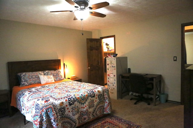 carpeted bedroom with a ceiling fan