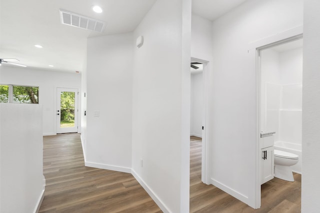 303 W Odell St, Marionville, MO 65705 - hall featuring wood finished floors, recessed lighting, and baseboards