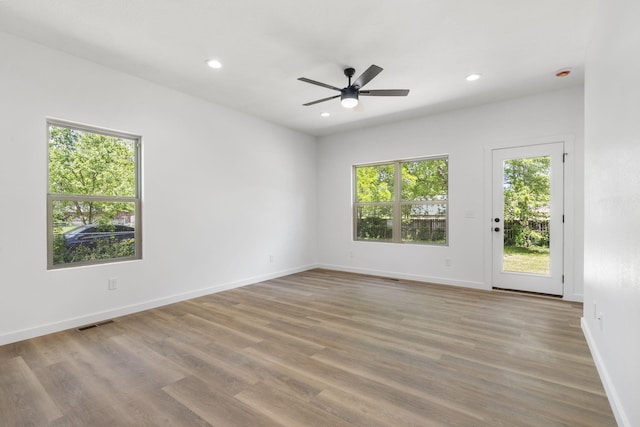 303 W Odell St, Marionville, MO 65705 - empty room with a ceiling fan, recessed lighting, wood finished floors, and baseboards