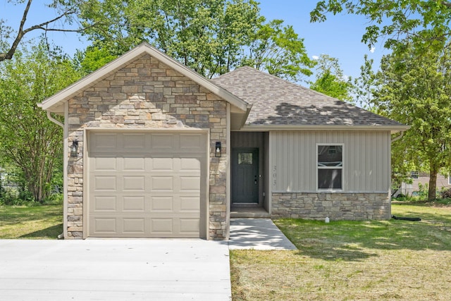 303 W Odell St, Marionville, MO 65705 - ranch-style house with stone siding, concrete driveway, an attached garage, roof with shingles, and a front lawn