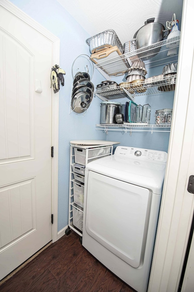 824 E Crystal Ave, Nixa, MO 65714 - laundry area with dark wood-style flooring, baseboards, and washer and clothes dryer