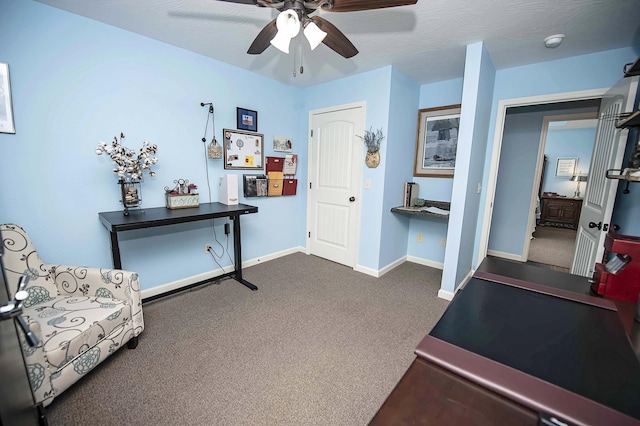 824 E Crystal Ave, Nixa, MO 65714 - living area featuring dark carpet, a ceiling fan, and baseboards