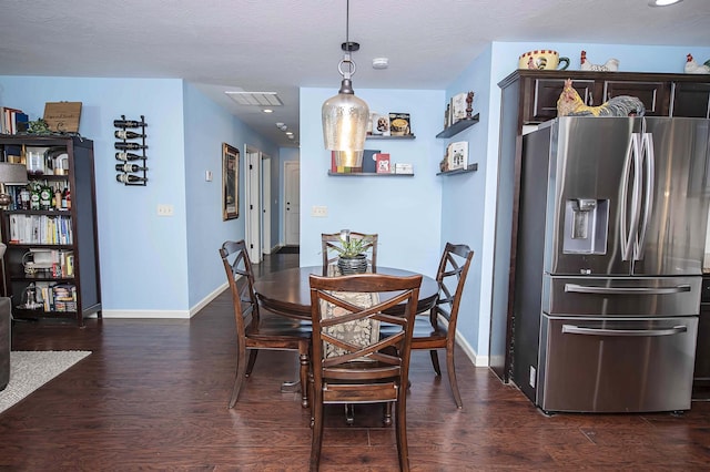 824 E Crystal Ave, Nixa, MO 65714 - dining room with dark wood-style floors and baseboards