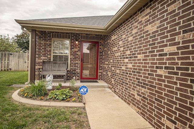 824 E Crystal Ave, Nixa, MO 65714 - entrance to property with fence, brick siding, and a shingled roof