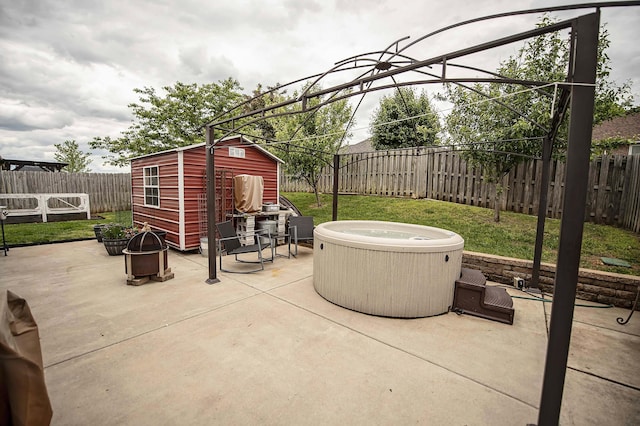824 E Crystal Ave, Nixa, MO 65714 - view of patio with a storage shed and an outbuilding