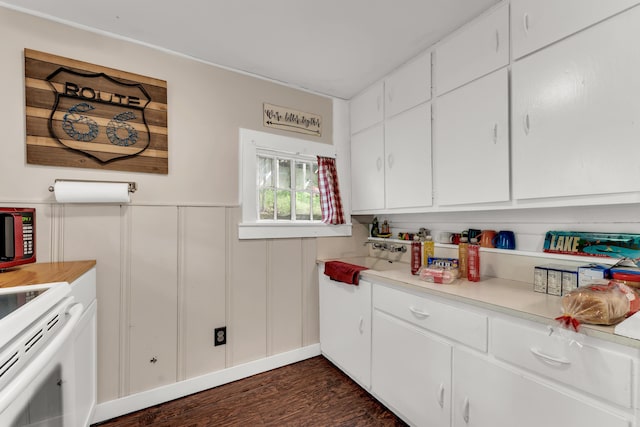 274 Beach Blvd, Rockaway Beach, MO 65740 - kitchen with light countertops, dark wood-style flooring, white electric stove, white cabinets, and a decorative wall
