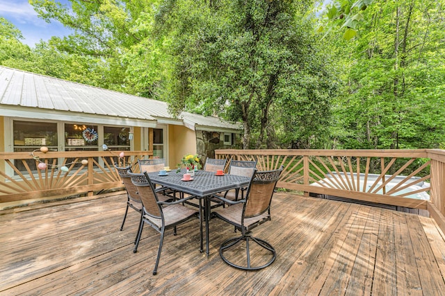 274 Beach Blvd, Rockaway Beach, MO 65740 - wooden terrace featuring outdoor dining space