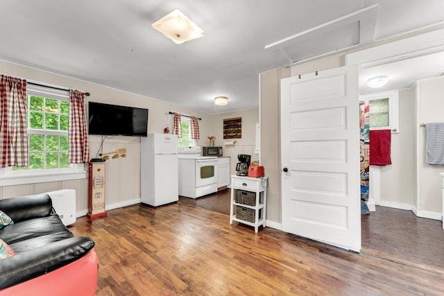 274 Beach Blvd, Rockaway Beach, MO 65740 - living room with attic access, dark wood finished floors, and baseboards