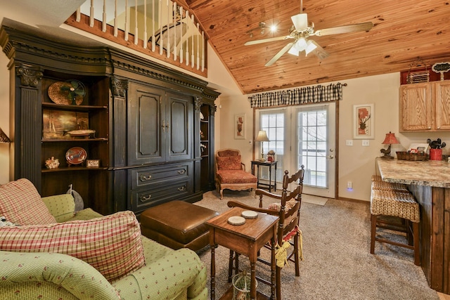 147 Liberty Ln, Kimberling City, MO 65686 - living area featuring light colored carpet, a ceiling fan, wooden ceiling, vaulted ceiling, and baseboards