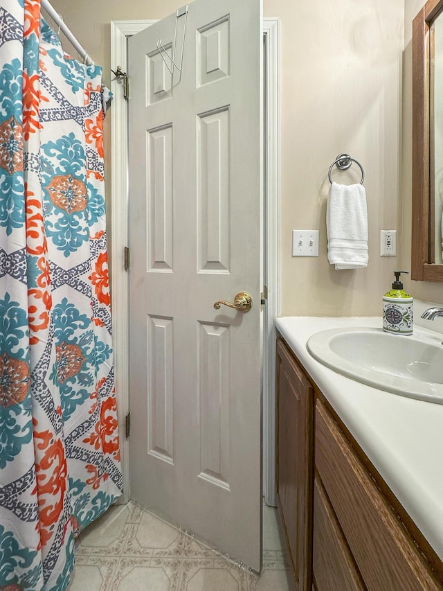 147 Liberty Ln, Kimberling City, MO 65686 - bathroom featuring vanity and a shower with shower curtain