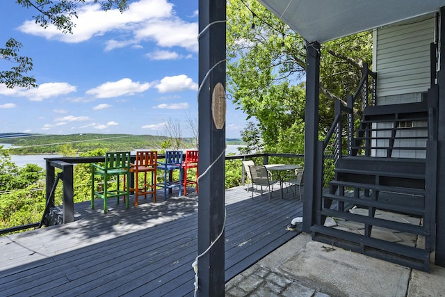 147 Liberty Ln, Kimberling City, MO 65686 - wooden deck featuring outdoor dining area, a water view, and stairway