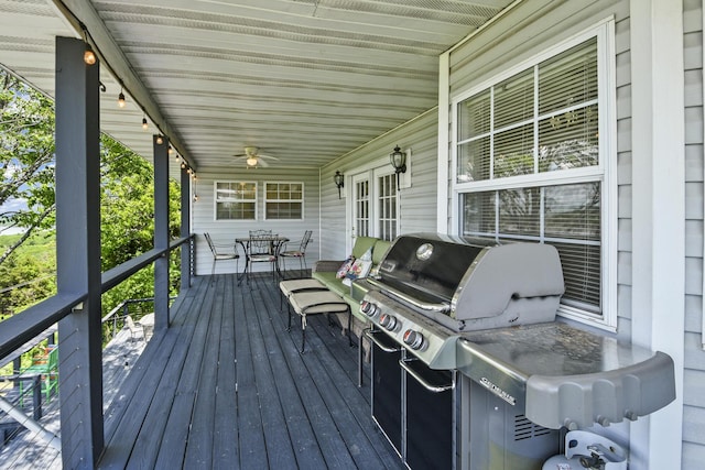 147 Liberty Ln, Kimberling City, MO 65686 - wooden terrace featuring a porch, a ceiling fan, and area for grilling