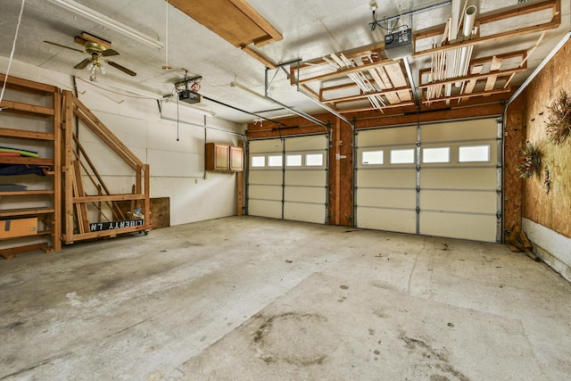 147 Liberty Ln, Kimberling City, MO 65686 - garage with a garage door opener and ceiling fan