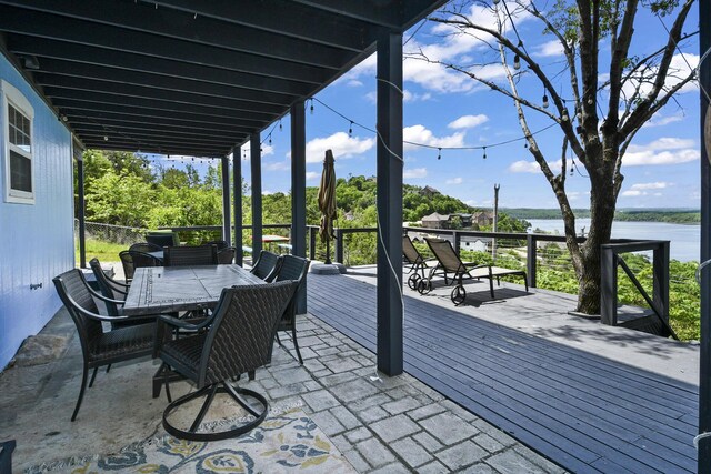 147 Liberty Ln, Kimberling City, MO 65686 - wooden deck with a water view and outdoor dining area