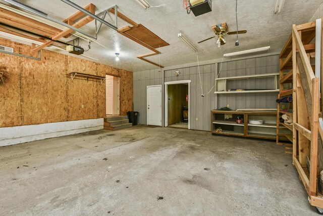 147 Liberty Ln, Kimberling City, MO 65686 - garage featuring a garage door opener