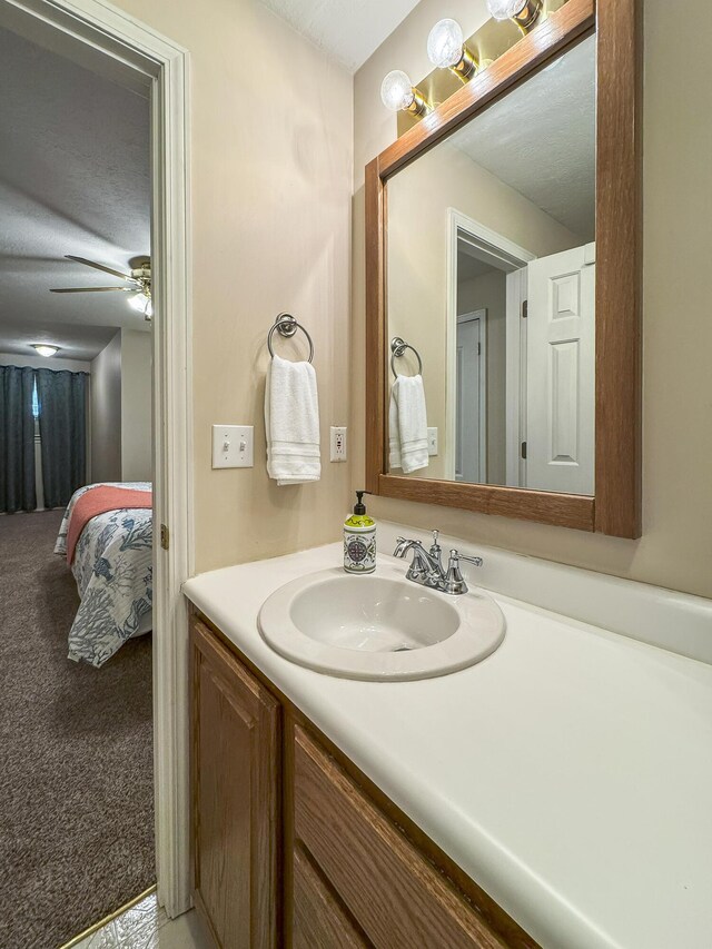 147 Liberty Ln, Kimberling City, MO 65686 - bathroom with vanity and a ceiling fan