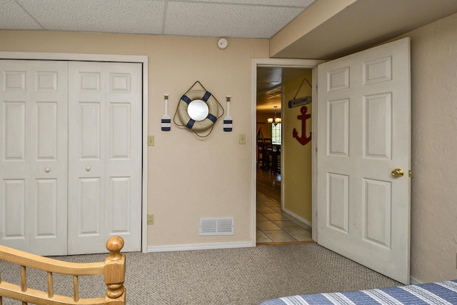 147 Liberty Ln, Kimberling City, MO 65686 - carpeted bedroom featuring a closet and a paneled ceiling