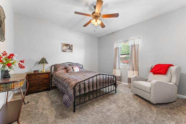 bedroom featuring carpet flooring, baseboards, and ceiling fan