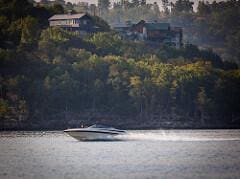 water view with a heavily wooded area