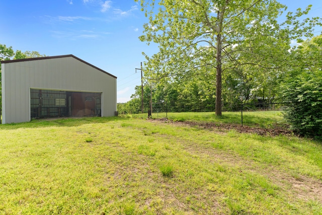 245 Country Hills Rd, Branson, MO 65616 - view of green lawn featuring an outbuilding, a garage, and an outdoor structure
