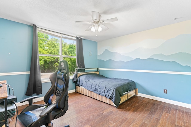 245 Country Hills Rd, Branson, MO 65616 - bedroom with wood finished floors, baseboards, ceiling fan, and a textured ceiling